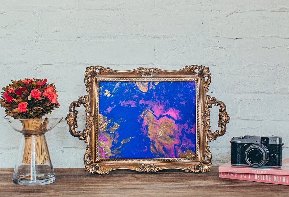 Blue and Pink Abstract art by Cassondra Eastham. 2019 Acrylic paint pour with gold leaf.